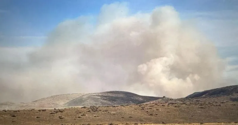 13,600-acre fire burning near Highway 50