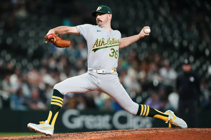 A's pitchers combine for 18 strikeouts in 7-4 win over Mariners