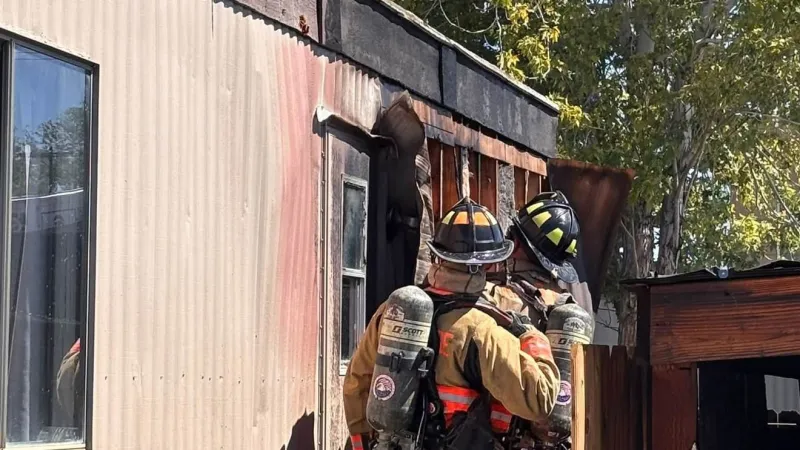 Reno firefighters extinguish mobile home carport fire near airport; no injuries reported