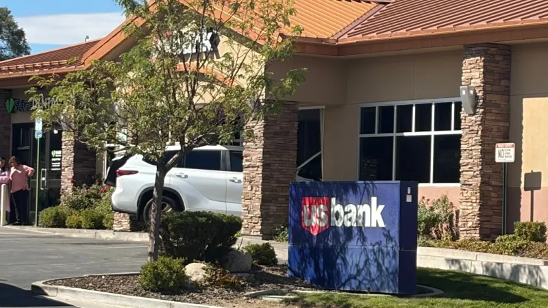 One person hurt after car crashes into U.S. Bank entryway