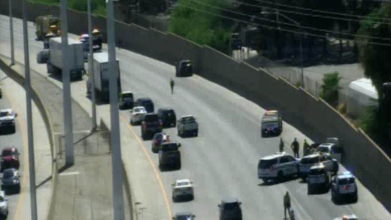 Police investigate armed robbery that led to pursuit, crash on I-11 near Tropicana