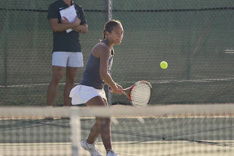 Boys, girls remain hot on court by picking up 2 wins each