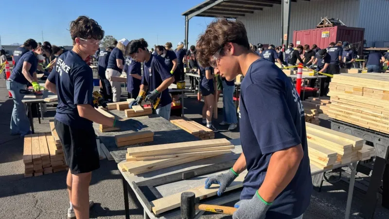 Mothers and teen sons team up Saturday to build beds with Sleep in Heavenly Peace