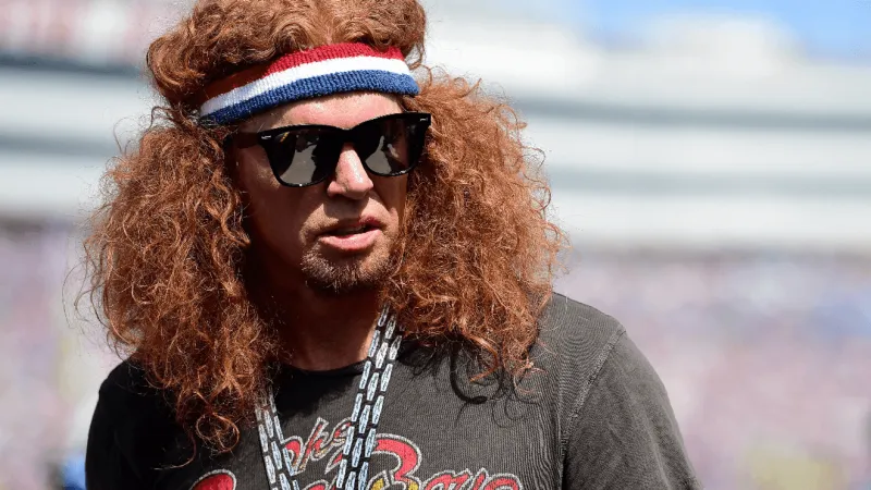 Carrot Top hospitalized but improving, awake and breathing on his own, publicist says