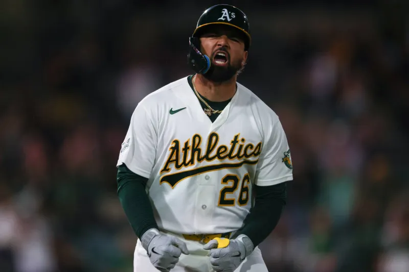 A's rally with 2 homers in 8th to beat Angels