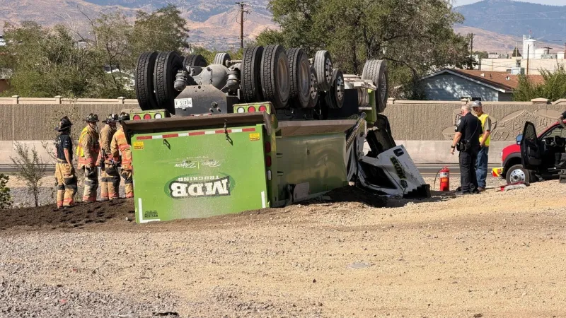 Dump truck overturns on southbound I-580 in Reno, driver hurt