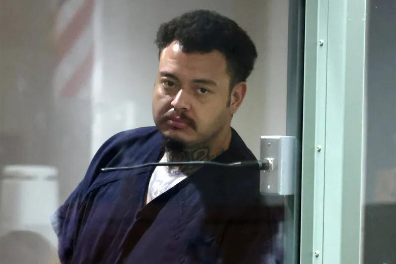 Police: Convicted killer shot neighbor as victim's sons waited for their dad