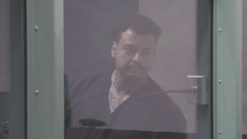 Las Vegas man accused of killing neighbor was prohibited from having a gun, records show