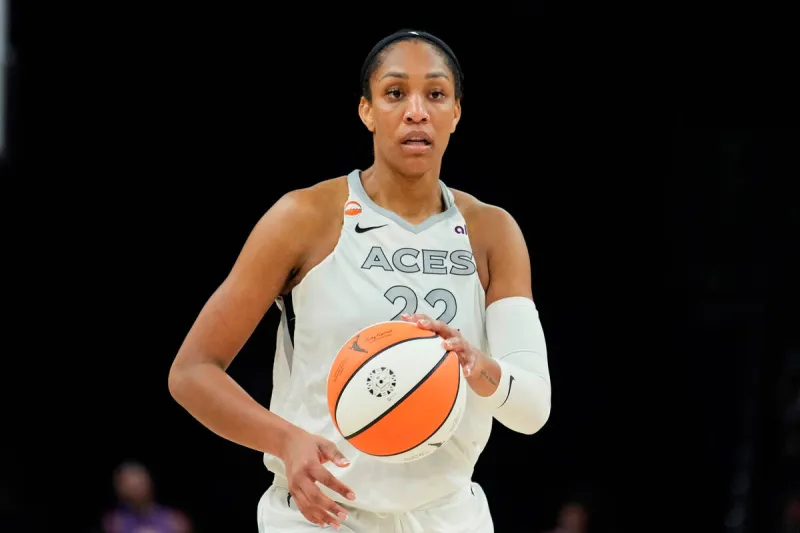 Block or charge? Video of A'ja Wilson colliding with arena staffer goes viral
