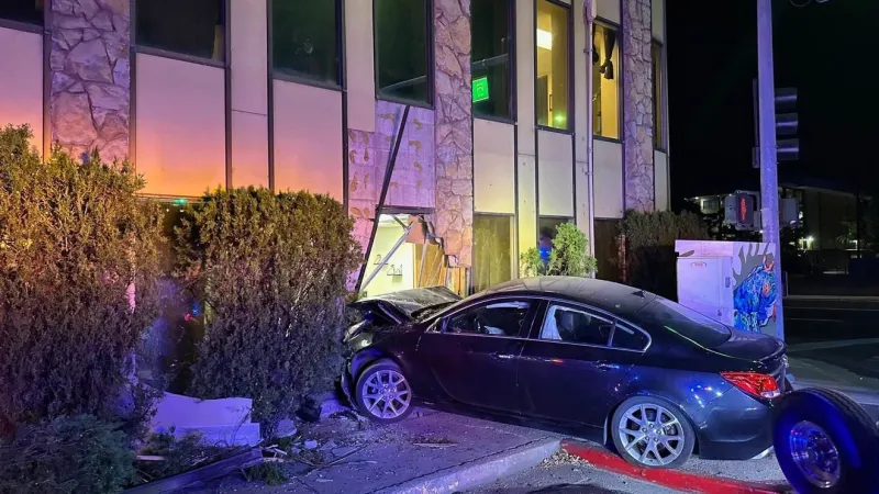 Reno Fire responds after car crashes into building near Wells Avenue and Mill Street