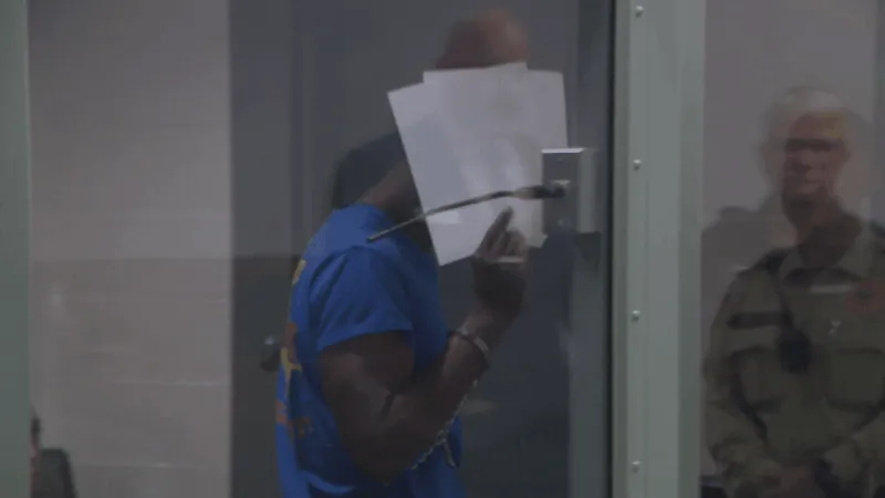 Surveillance video helped identify suspect in deadly parking lot shooting, report says