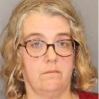 Milton Woman named co-defendant, charged in 55 dog torture case