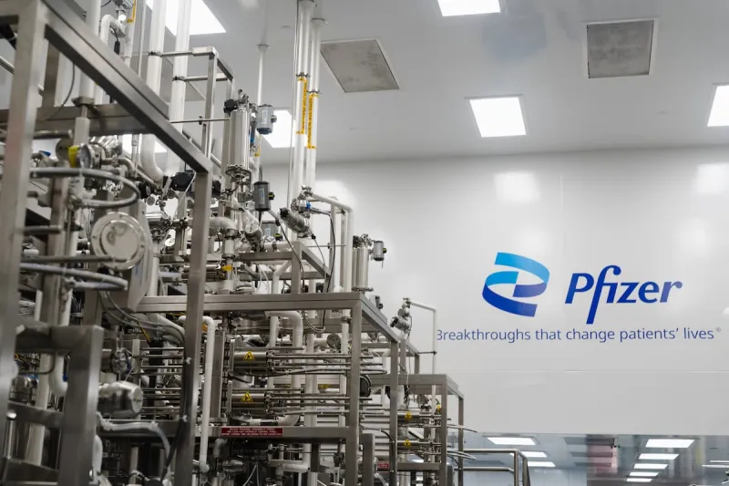 Pfizer lifts profit view as cuts offset flat sales outlook