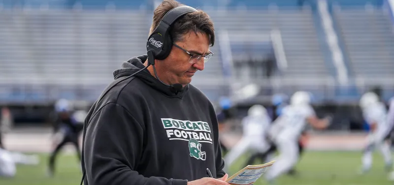 A student filed a sexual misconduct complaint against Ohio University's former football coach before his firing
