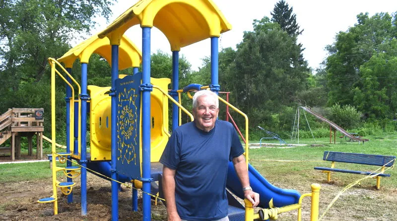 Great-grandson of Hanoverton park's namesake helps install new playground equipment