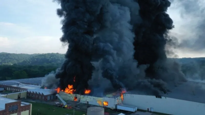 Officials don't expect area to be affected by smoke from Parkersburg Warehouse fire