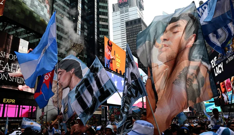 Argentina Fans Party Throughout The Night In Times Square Before World Cup Final