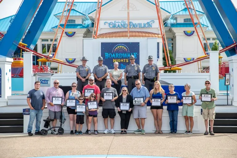 Ohio State Highway Patrol partners with Cedar Point to recognize 13 survivors of serious-injury crashes during "Saved by the Belt" event