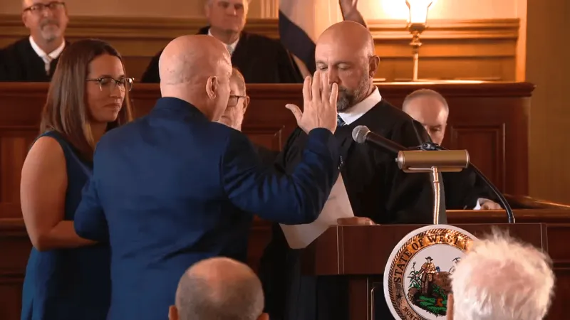 West Virginia Supreme Court Justice Bill Flanigan sworn in at investiture ceremony