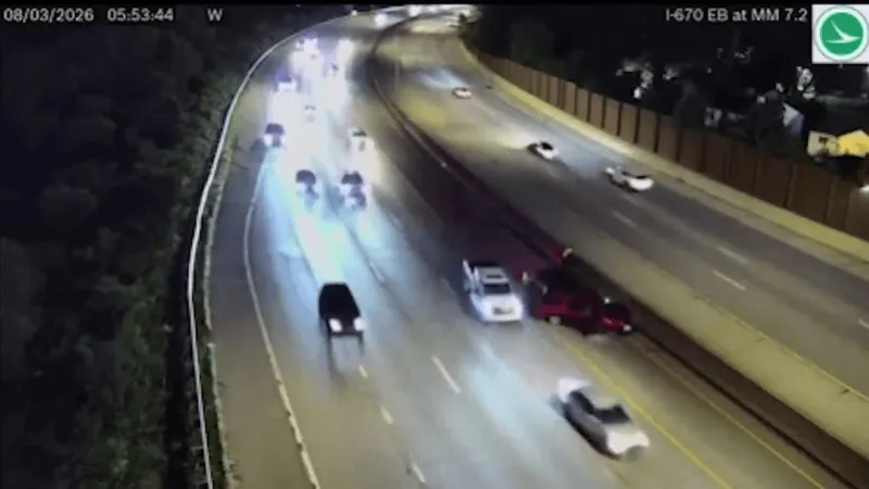 Wild video shows worker narrowly avoids being hit in I-670 crash involving disabled SUV
