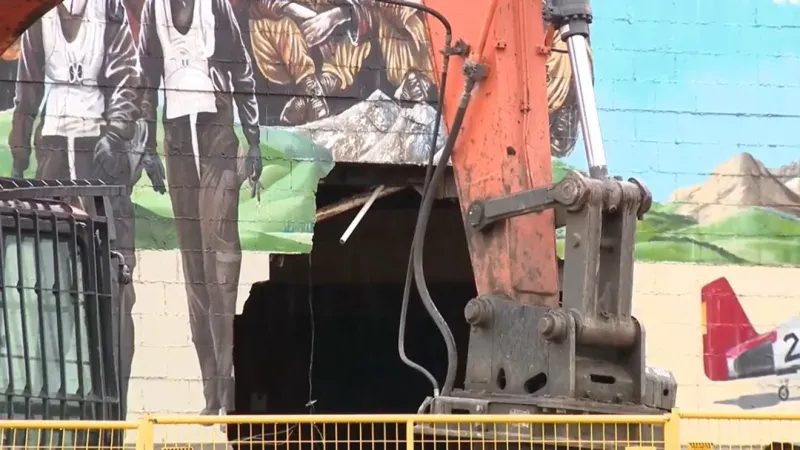 Artist says he wasn't properly notified as demolition begins on Tuskegee Airmen mural site