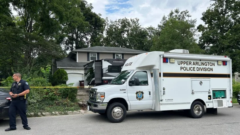 Dead woman found during financial crime investigation at Perry Township home