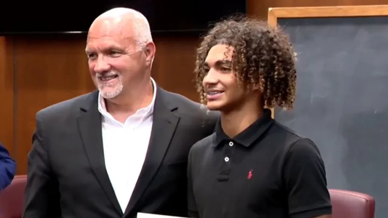 Local student honored for state title, records