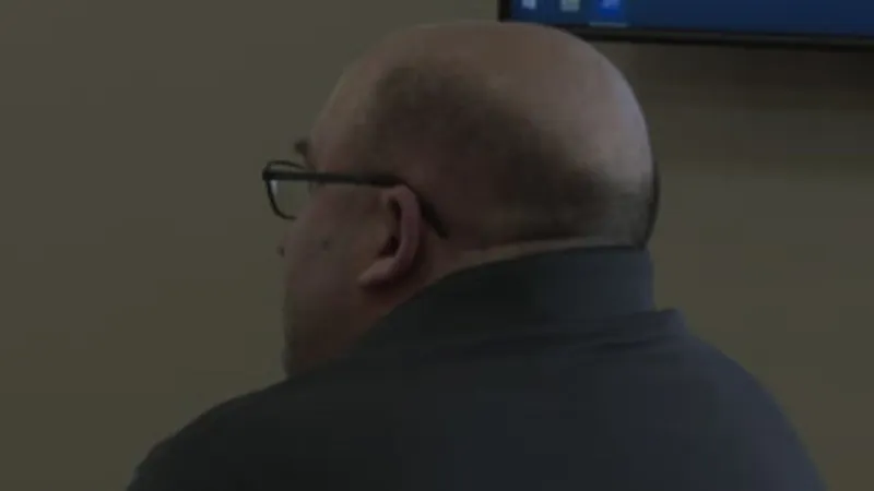 Ex-Bellaire teacher pleads guilty to 52 child porn counts; bond revoked before sentencing
