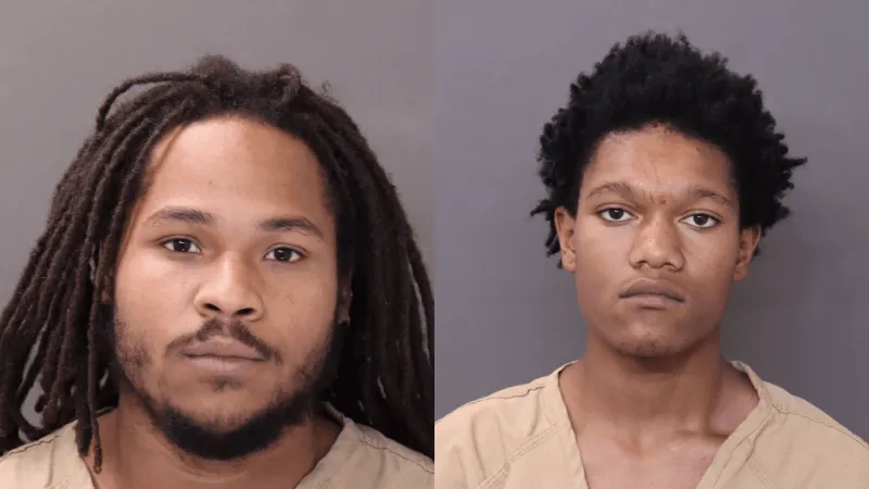 Two men charged in armed robbery after police chase and crash