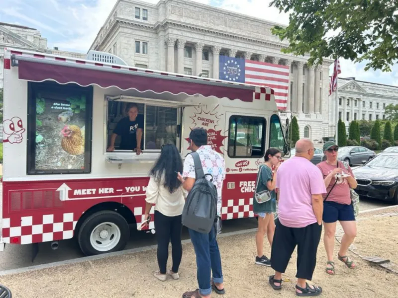 Chicken Wars!: PETA parking free vegan chicken tender truck in front of local fast food spot