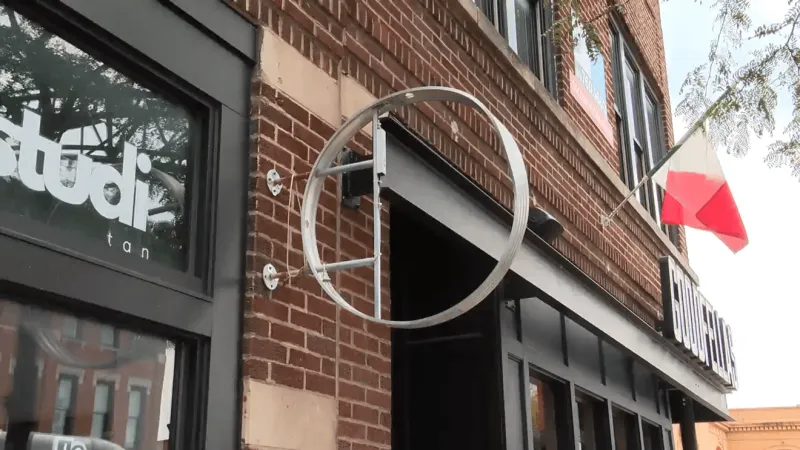 Short North business owner seeks more security after vandals destroy sign for third time