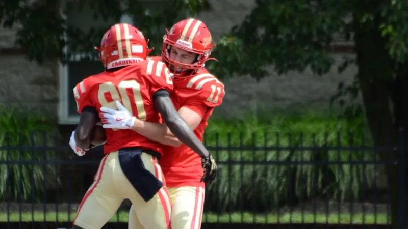 Four interceptions fuel football to 35-14 road win