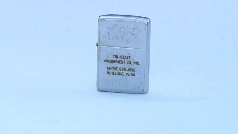 Belmont County honors veterans with Zippo-style challenge coins at Wall That Heals visit
