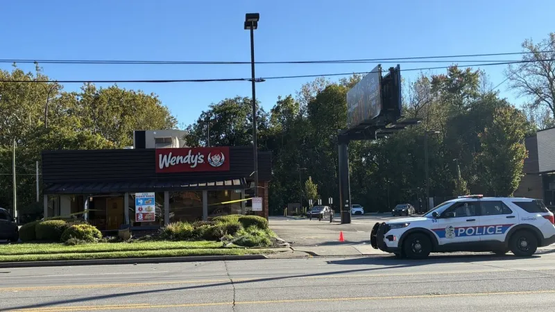 Hit-and-run crash sends minivan through Wendy's window