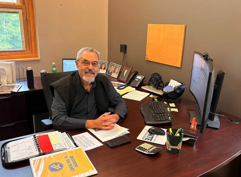Interim Village manager signs on