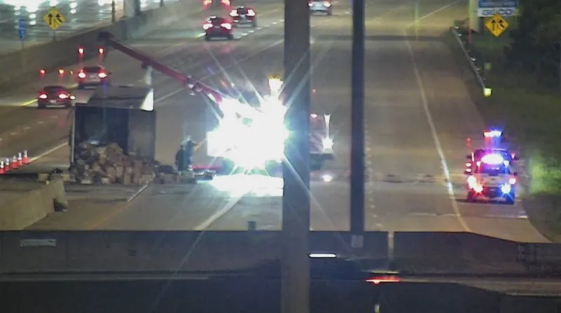 Semi-truck carrying 30,000 lbs of frozen food catches fire on I-270