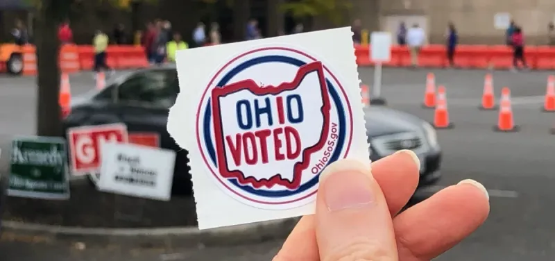 Ohio voters begin casting ballots in close governor and US Senate races