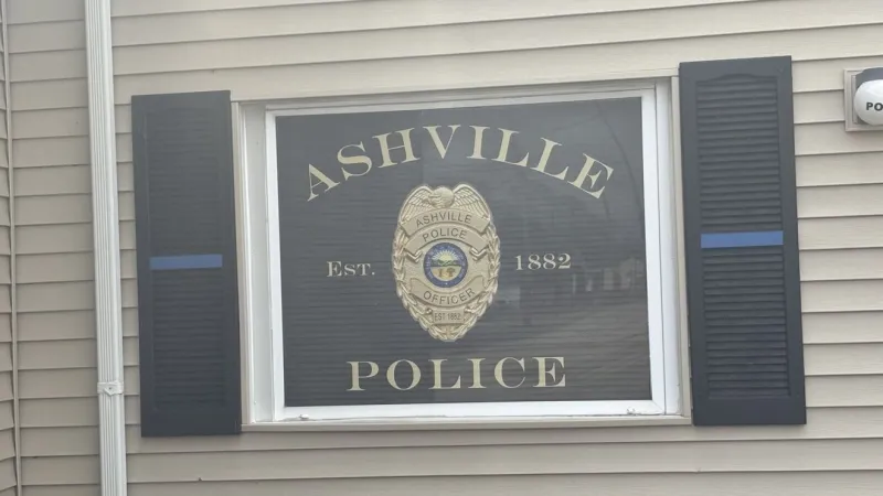 Ashville police rescue woman from burning home after late-night fire call