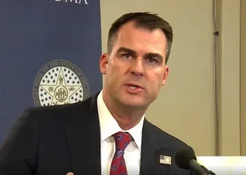 Stitt Signs No More Phones in School into Law