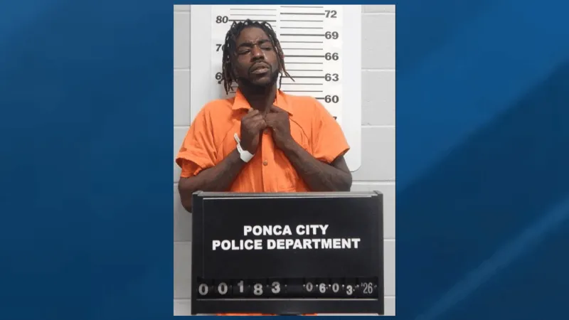 Kansas man arrested after traffic stop allegedly reveals gun, drugs
