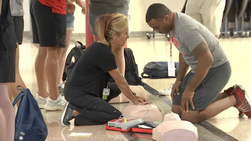 Union Public Schools coaches attend Hands-Only CPR training
