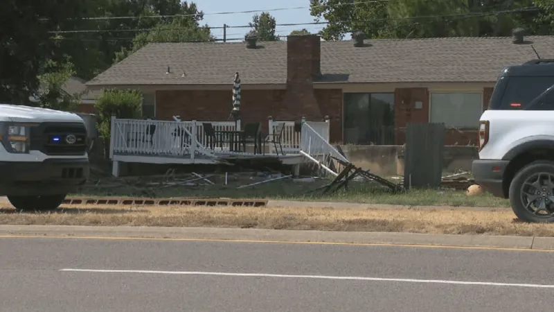 Police respond after semi-truck crashes into home near NW 70th and NW Expressway