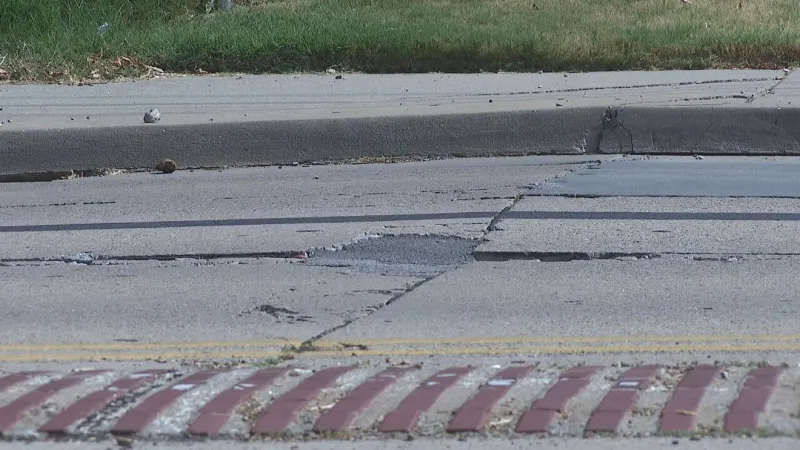 Norman Road Buckles Under Extreme Monday Heat