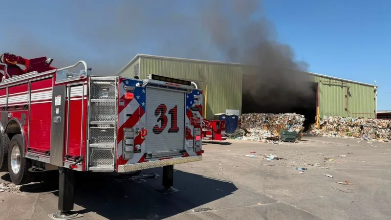 Oklahoma City fire crews battle conveyor belt fire at recycling facility