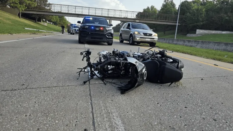 Motorcyclist suffers only minor injuries after crashing into light pole