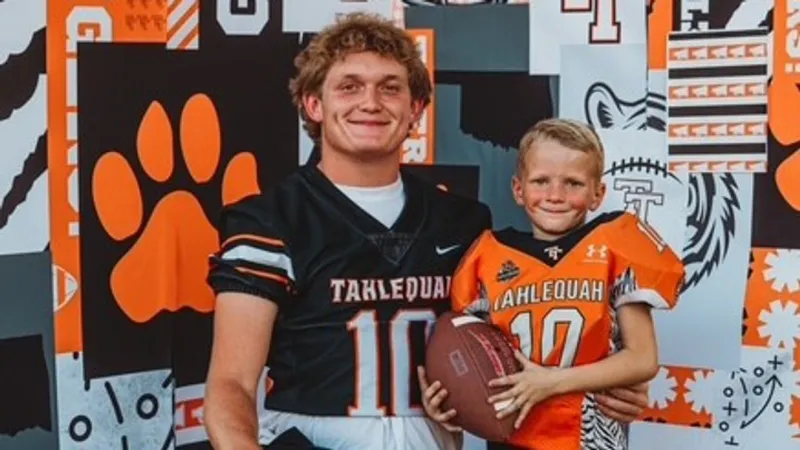 Tahlequah senior football player surprises 1st grader who wears same jersey number