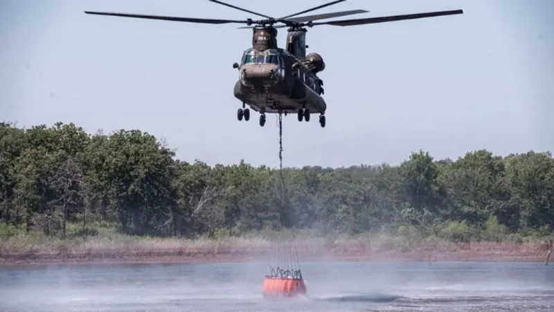 Oklahoma Gov. Stitt sends National Guard helicopters to aid Arkansas wildfire fight