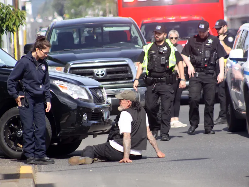 Vehicle, bicyclist collide on Main Street