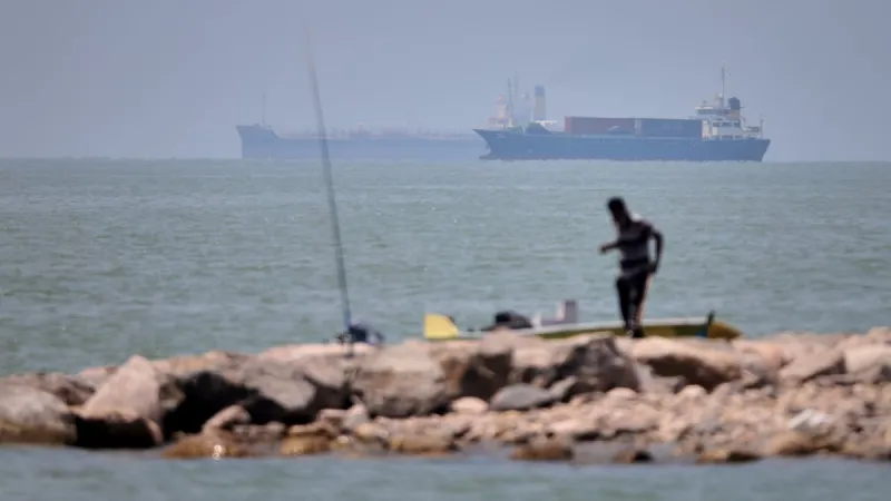 UN agency pauses evacuation of ships through the Strait of Hormuz after attack on vessel