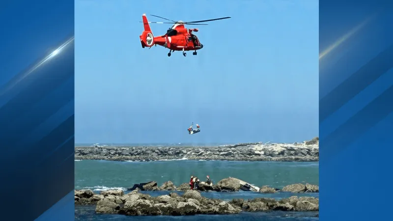 Two rescued Monday after boat takes on water at Coquille River South Jetty rocks